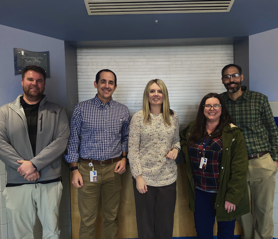 Brady Dowling, Matthew Ewald, Emily Hafey, Kelly Booth, and Steven McClamrock pose for a photo.